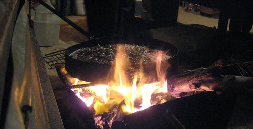 Open flame fish frying